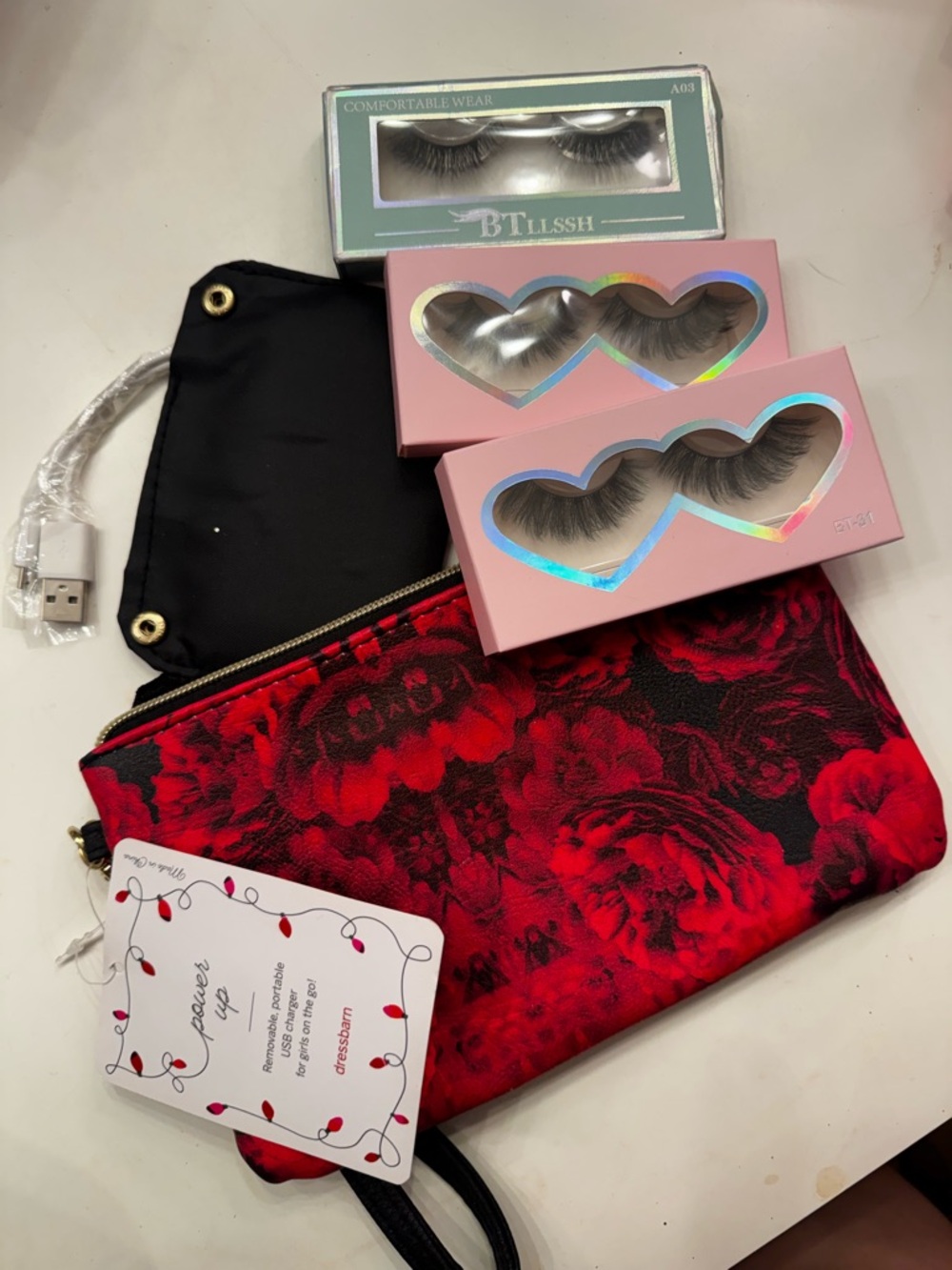Red Floral Wristlet Clutch Bag with phone charger and lashes